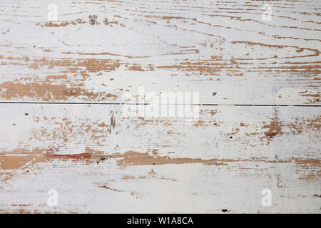 White wooden floorboards. Distressed worn floorboard background painted white Stock Photo