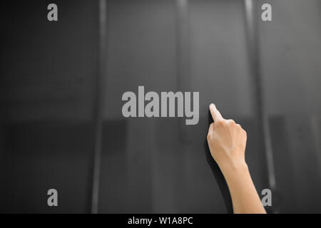 hand using black interactive panel Stock Photo