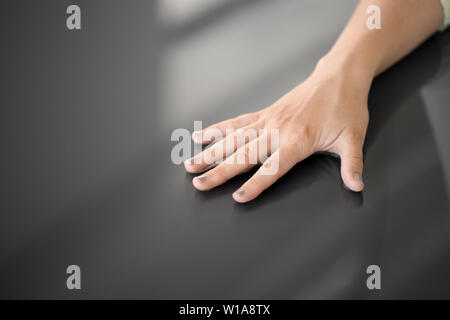 hand using black interactive panel Stock Photo