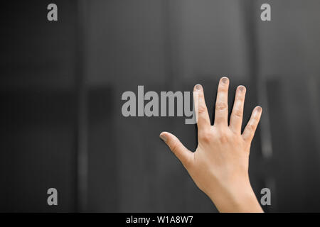 hand using black interactive panel Stock Photo