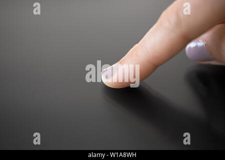 hand using black interactive panel Stock Photo