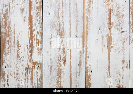 White wooden floorboards. Distressed worn floorboard background painted white Stock Photo