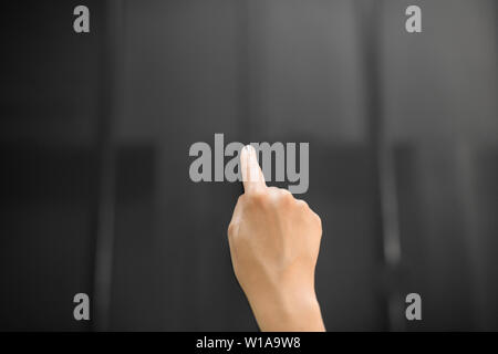 hand using black interactive panel Stock Photo