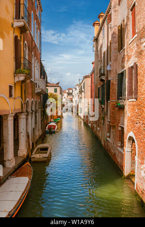 View of a characteristic Venice canal and old traditional houses in the ...