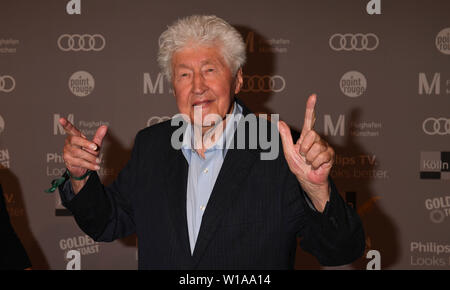 Munich, Germany. 27th June, 2019. The choir director Gotthilf Fischer stands on the red carpet of the Audi Director's Cut and the branch meeting Movie Meets Media at the Filmfest Munich which takes place from 27.06.2019 to 06.07.2019. Credit: Felix Hörhager/dpa/Alamy Live News Stock Photo