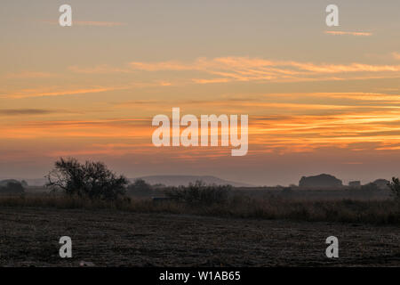 Colorful sunset sky background with reddish colors Stock Photo