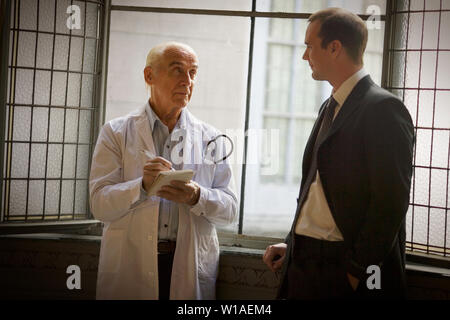 View of a doctor engrossed in a conversation. Stock Photo