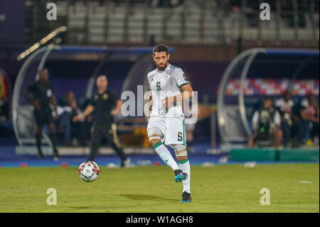 Cairo, Egypt. 1st July, 2019. Rafik Halliche of Algeria during the 2019 African Cup of Nations match between Algeria and Tanzania at the Al Salam Stadium in Cairo, Egypt. Ulrik Pedersen/CSM/Alamy Live News Stock Photo