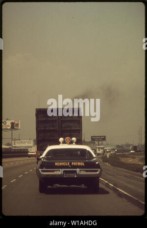 Air Pollution Control Department Officers Following Truck Violator Who Later Received A Citation Stock Photo Alamy