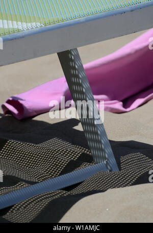 Colorful geometric shapes on the Italian beach, on a sunny day Stock Photo