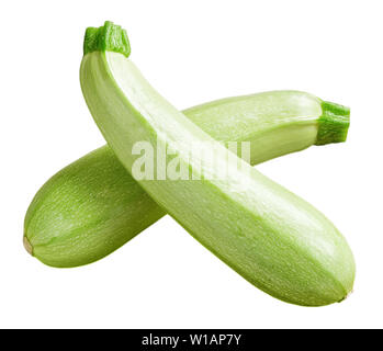 Two fresh green courgettes or zucchini criss-cross isolated on white background. Fresh vegetables, vegetarianism and healthy eating. Close-up. Stock Photo