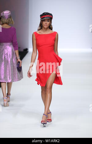 Models walk the runway at the Guido Maria Kretschmer show during the Mercedes-Benz Fashion Week Berlin Spring/Summer 2020 at ewerk on July 1, 2019 in Berlin, Germany. Stock Photo