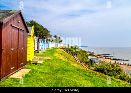 Colourful beach huts at the seaside beach in Felixstowe, Suffolk, UK Stock Photo