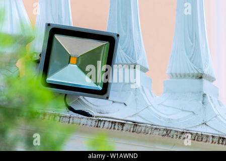LED flood light, spotlight on wall. Safety concept Stock Photo