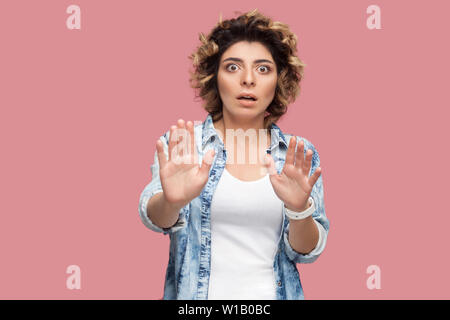 Scared, worry and face of Indian woman on pink background with