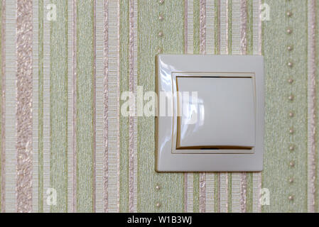 Plastic light switch, turn on or turn off the lights. Stock Photo