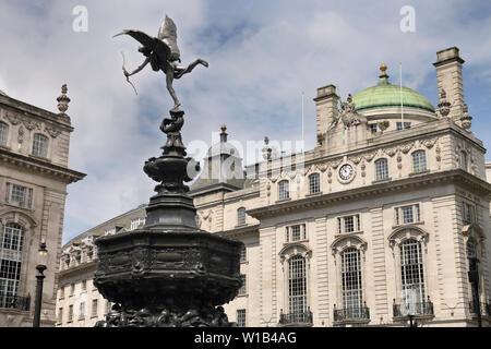 Shaftesbury Memorial Fountain toped by winged Anteros in Piccadilly Circus with The Quadrant on Regent street London England Stock Photo