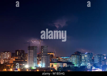 Thunder, lighting and storm in dark night sky. Stock Photo