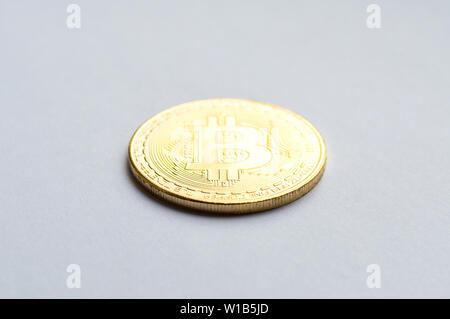 Golden bitcoin on white background. Concept mining. Copyspace Stock Photo