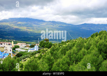 Panoramic view of Chefchaouen, one of the most touristic towns in Morocco, on a cloudy day Stock Photo