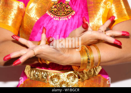 Female hands of professional Indian dancer demonstrates dance mudra (gesture) of Bharatanatyam classical dance in closeup view Stock Photo