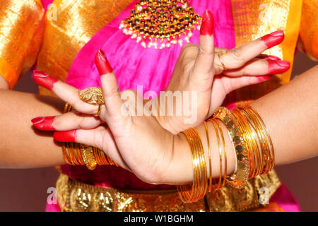 Female hands of professional Indian dancer demonstrates dance mudra (gesture) of Bharatanatyam classical dance in closeup view Stock Photo
