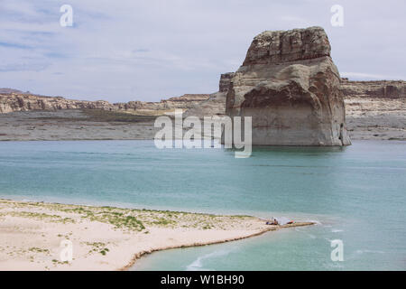 A family in a beach day in Lone Rock Beach, Lake Powell, Big Water, Utah, USA Stock Photo