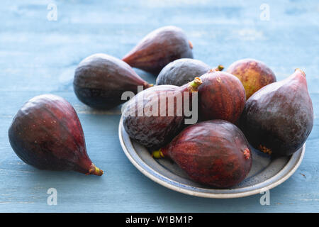 Fresh Figs Close Up on a Wooden Background Stock Photo