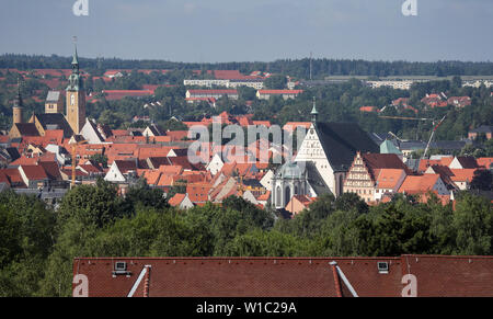 27 June 2019, Saxony, Freiberg: Panoramic view over the daily installations of the shaft "Reiche Zeche" of the colliery "Himmelfahrt Fundgrube" to the city Freiberg. Freiberg is the oldest and most important silver mining area in the Erzgebirge. The region applies for the title on the Saxon side with seventeen, on the Czech side with five parts. The selected monuments, natural and cultural landscapes represent the most important mining areas and epochs of Saxon-Bohemian ore mining as witnesses of 800 years of history. The pits "Reiche Zeche" and "Alte Elisabeth" are still used by the TU Bergak Stock Photo