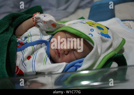 newborn mixed baby boys in hospital