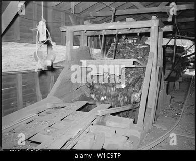 Dumping a car of coal at the tipple. P V & K Coal Company, Clover Gap Mine, Lejunior, Harlan County, Kentucky. Stock Photo