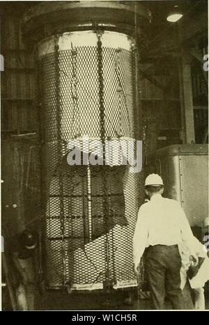Archive image from page 65 of Design for implosion of concrete. Design for implosion of concrete cylinder structures under hydrostatic loading . designforimplosi00hayn Year: 1979  Figure B-12. Fragments of failure hole from specimen 2-2.    Figure B-13. Post-implosion view of specimen 3-1 (t/D = 0.037, sim- ple support). 60 Stock Photo