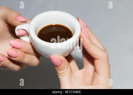 Taking the neapolitan coffee in ceramic cup Stock Photo