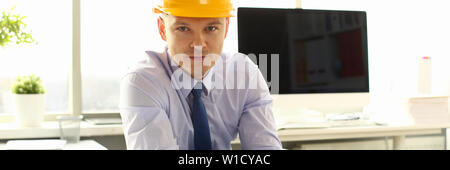 Young Architect Freelance Man Working on Blueprint Stock Photo