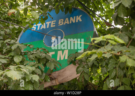 Bengaluru, India June 27,2019 : State Bank of India ATM board covered with trees Stock Photo