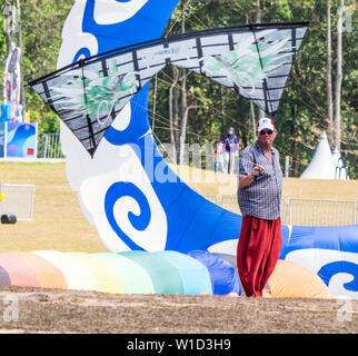 Pasir Gudang, Malaysia - March 3, 2019: Canadian kite flier Steve De Rooy flying a quad line kite on short lines at the 24th Pasir Gudang World Kite F Stock Photo