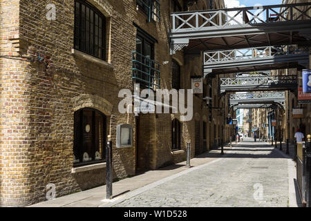 Shad Thames is a historic riverside street next to Tower Bridge in Bermondsey and is also an informal name for the surrounding area in London Stock Photo