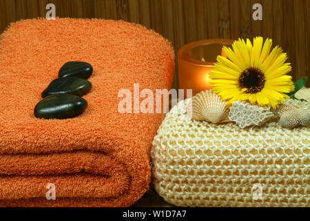 Beautiful natural composition of spa therapy objects, orange and yellow Stock Photo