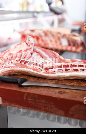 Meat prepared for sale in butcher’s shop Stock Photo