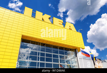 Samara, Russia - June 22, 2019: IKEA logo against a blue sky. IKEA is the world's largest furniture retailer Stock Photo