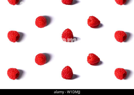 Pattern made of fresh raspberry isolated on white. Stock Photo