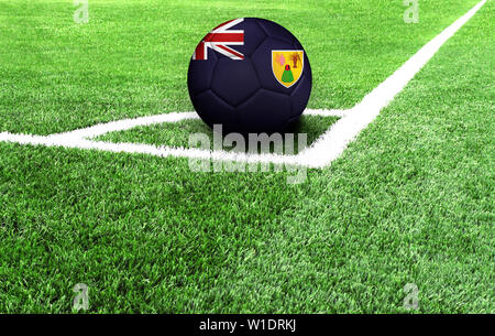 soccer ball on a green field, flag of Turks and Caicos Islands Stock Photo