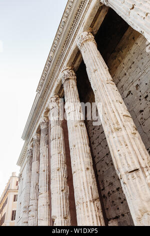 Detail of entablature and columns from The Temple of Hadrian, in Rome, Italy. Stock Photo