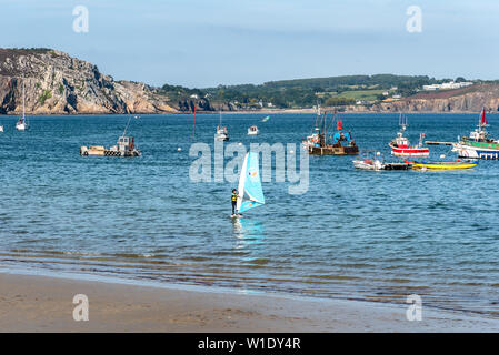 Morgat, France - August 4, 2018: Windsurfer in the beach of Morgat a sunny day of summer Stock Photo