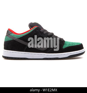 VIENNA, AUSTRIA - AUGUST 25, 2017: Nike Dunk Low Pro SB black, green and red sneaker on white background. Stock Photo