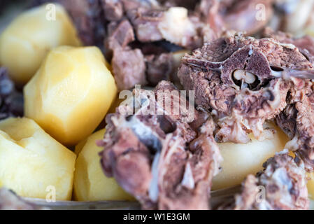 Boiled lamb meat and whole potatoes close up Stock Photo