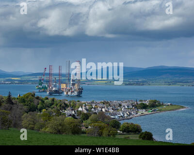 Oil platforms and rigs in the Cromarty Firth next to the town of Cromarty, Black Isle, Highland, Scotland Stock Photo