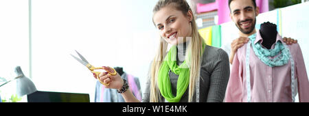 Two fashion designers at workplace creating Stock Photo