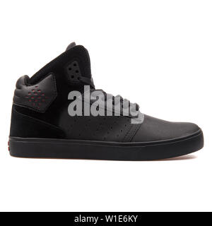 VIENNA, AUSTRIA - AUGUST 25, 2017: Supra Atom black sneaker on white background. Stock Photo