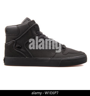 VIENNA, AUSTRIA - AUGUST 25, 2017: Supra Vaider black sneaker on white background. Stock Photo